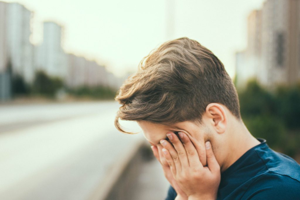 tired guy in bedtime routines for a better night's sleep