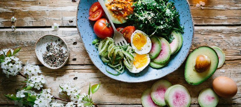 a well balanced meal on a wooden table - eating a balanced diet